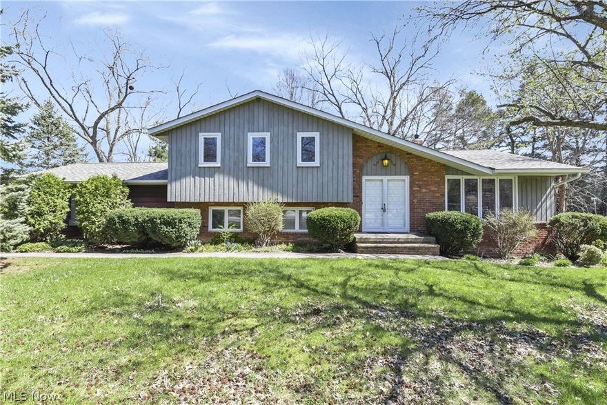 Welcome to this well-maintained split-level home, proudly owned by the same family since 1972, nestled on a wooded cul-de-sac lot just under a half acre in the highly desirable Aintree Park neighborhood of Mayfield Village. Featuring a new roof installed in 2026, this home offers both peace of mind and lasting value.

Step inside through the welcoming foyer with double front doors into spacious L-shaped formal living and dining rooms featuring raised ceilings—perfect for both everyday living and entertaining. The eat-in kitchen offers ample cabinet and counter space, stainless steel appliances, and a charming garden window overlooking the private backyard.

Upstairs, you’ll find three generously sized bedrooms and a full bath, with recently refinished hardwood floors throughout the second level. The lower level features a fourth bedroom, second full bath, and a cozy family room with a wood-burning fireplace, which opens to an enclosed sunroom with three walls of windows—ideal for enjoying the peaceful, wooded setting year-round.

Additional highlights include a partial unfinished basement with laundry area and abundant storage, an oversized side-load two-car garage, extra-wide driveway with additional parking space, and a partially fenced backyard.

Conveniently located near freeways, shopping, dining, and the North Chagrin Metroparks Reservation. Enjoy all the amenities and community benefits of Mayfield Village.

A fantastic opportunity to personalize and make this home your own—truly a great place to call home.