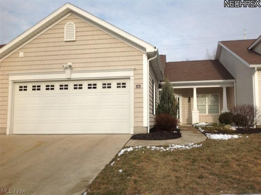 This amazing ranch style condo has it all!  Lots of upgrades!  Kitchen has maple cabinetry w/ glass doors, high definition  Wilsonart counter tops, engineered hand-scraped wood flooring.  Dinette has a bay window.  All appliances are stainless steel.  large foyer with wainscoting, cathedral ceilings, sunny sun room which leads to a patio, walk-in closets, upgraded trim package throughout.  Clubhouse with kitchen/billiard room/exercise and party room is included with pd. monthly HOA.