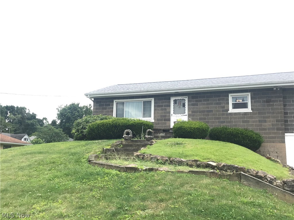 Well maintained 2 bedroom (possible 3rd bedroom) block home sitting on approximately 1/4 acre. Roof replaced 2020, new basement carpet 2020, new hot water tank in 2019, new garage door and furnace in 2010, new windows in 2007, and central AC installed in 2005. Call today