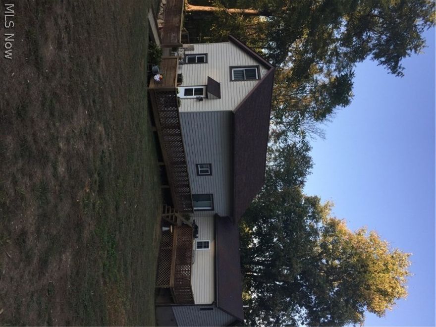 Exquisite cape cod style home located in Maysville schools.  Updates all throughout the house, from the beautiful kitchen, to the 2 spacious bathrooms.   The whole house has been repainted, including walls, trim and ceilings.  Open loft area provides additional living space that overlooks the great room. You can stay cozy and warm from the inside or enjoy views of your 1 acre from the wrap around deck. Outdoor shed for extra storage and 30' x 40' spot has been cleared and leveled for any building that you may want to add.  Minutes from the north end of town, south end of town or the interstate.  Property is eligible for LMIT financing, so buyer pays no closing costs!!