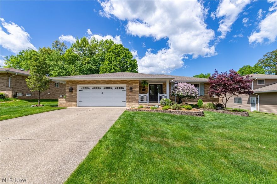 One floor living at its finest in this all brick ranch home! Updated top to bottom and inside and out! Stunning interior finishes! Starting with the  front porch with new custom railings and copper lanterns and leading you through the double front entry doors. Engineered hardwood floors, crown moldings and baseboards are just some of the details in this beautiful home. Gourmet kitchen with stainless appliances, quartz countertops and backsplash’s, and high-end range hood.The family room offers custom built bookcases with LED  lighting and a custom built gas fireplace. Sliding Pella doors with between the glass blinds lead you to private backyard with 6 foot vinyl privacy fence with custom PVC gate from the porch door. Three bedrooms, two updated baths and plenty of storage! Downstairs there is a finished rec room and kitchenette. Close to shopping, downtown, freeways and restaurants. Too many updates to include! Call today to see this stunning one floor living home.