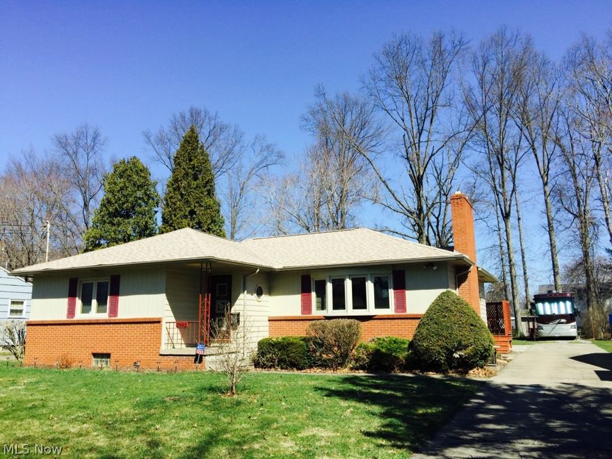 Absolutely Phenomenal 3 Bedroom/2 & 1/2  Bath Home with Private, Scenic Backyard.  Home Features Include:  Large Updated Kitchen with Oak Cabinets, New Corian Counter tops, New Appliances, & New Ceramic Tile Flooring, Large Front Living Room with Brick Fireplace, 3 Large Bedrooms & an Awesome Back Sun Room Leading to a Private, Scenic Backyard.  Basement is Finished with Rec. Room Area, Laundry Room, & 2nd Full Bath.  First Floor Bath has been updated with Whirlpool Tub & Large Vanity Area.  Updates Include:  New Roof - 2014, New Windows - 2010, Newer Furnace, Newer CA, & Newer HWT.  Home offers a Home Warranty.