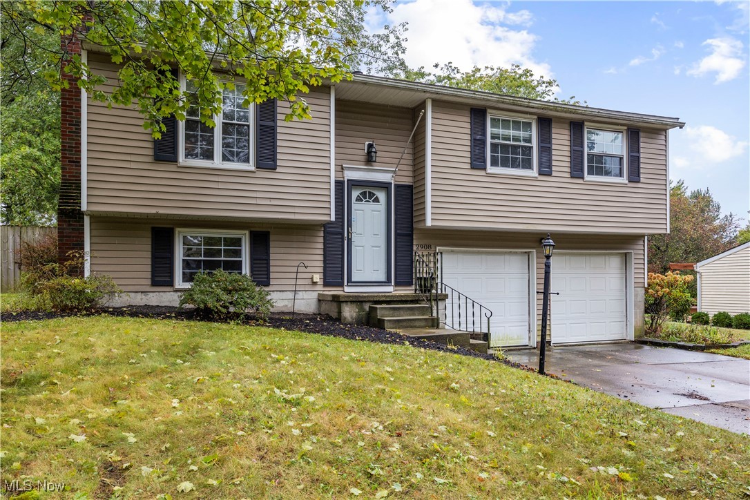 Welcome home to this spacious 3-bedroom, 1.5-bath bi-level in the heart of Stow! Offering nearly 2,400 square feet of living space, this home features a bright and open layout perfect for comfortable everyday living and entertaining. The main level includes a generous living room and dining area with plenty of natural light, along with a functional kitchen ready for your personal touch. Three nicely sized bedrooms and a full bath complete the upper floor. The finished lower level provides excellent additional living space, with a fireplace, ideal for a family room, home office, or recreation area that includes a convenient half bath. Enjoy the outdoors in the fully fenced backyard, perfect for pets, play, or gatherings. Situated on a .27-acre lot in a desirable neighborhood close to schools, parks, and shopping, this home offers space and comfort in a great location! For peace of mind, a one year home warranty is being offered. Call for a private showing today.