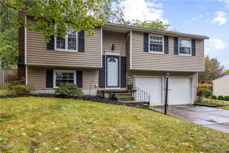 Welcome home to this spacious 3-bedroom, 1.5-bath bi-level in the heart of Stow! Offering nearly 2,400 square feet of living space, this home features a bright and open layout perfect for comfortable everyday living and entertaining. The main level includes a generous living room and dining area with plenty of natural light, along with a functional kitchen ready for your personal touch. Three nicely sized bedrooms and a full bath complete the upper floor. The finished lower level provides excellent additional living space, with a fireplace, ideal for a family room, home office, or recreation area that includes a convenient half bath. Enjoy the outdoors in the fully fenced backyard, perfect for pets, play, or gatherings. Situated on a .27-acre lot in a desirable neighborhood close to schools, parks, and shopping, this home offers space and comfort in a great location! For peace of mind, a one year home warranty is being offered. Call for a private showing today.