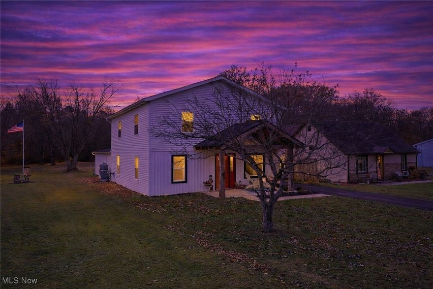 This 3-5 bedroom home with over 2000 square feet has been completely rebuilt from the ground up with exceptional care and craftsmanship. Sellers are offering concessions towards buyers closing costs to help purchase a shed or towards a new garage. Originally renovated for the owners’ own family, an unexpected relocation now gives you the rare chance to move into a home that feels truly like new. Nearly everything has been replaced: roof, windows, doors, 200-amp electric panel, wiring, plumbing, drywall, kitchen, bathrooms, septic system, Rheem heat pump, 3/4" hardwood floors, carpet, 80-gallon hot water tank, whole-house water filter and softener—all done with quality in mind. The open living room flows into a stunning eat-in kitchen with Quartz and Corian countertops, new appliances and a large pantry. There is also a family room that could be utilized as a first-floor primary suite featuring a full bathroom, huge walk-in closet for additional storage. The first floor also offers an office or additional bedroom. A half bath, pantry and first-floor laundry complete this level. Upstairs are three spacious bedrooms and a beautifully finished full bath. Outside, enjoy the brand-new covered front porch and the 0.69-acre lot with plenty of room to relax, garden, or entertain around the fire pit. Located in Brimfield Township, you’ll enjoy peaceful living with quick access to parks, shopping, restaurants, and the energy of downtown Kent and major highways. This home is truly move-in ready, thoughtfully rebuilt, and waiting for someone who appreciates quality. Come take a look and bring us an offer—make this beautiful home yours! At only $155 per square foot, this home and property offer incredible value. Many homes in the area sell for significantly more while offering far less in updates, acreage, or flexibility.