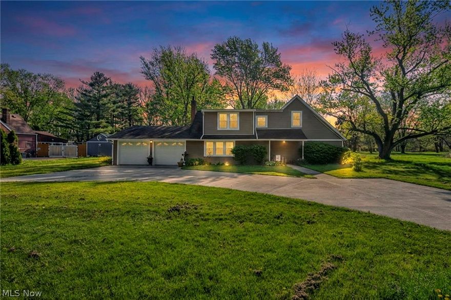 Exceptional find offering the perfect blend of country-style living w/modern updated conveniences-Just minutes from shopping, dining, & highways! Situated on nearly an acre in desirable Olmsted Township (no RITA taxes), extensively remodeled inside & out, delivering a fresh, elegant, move-in-ready interior w/minor finishing needed on the glamorous owner’s bath (most materials included). Step inside to a bright, open floor plan filled w/natural light & spacious, sun-drenched rooms. Showstopping chef’s kitchen designed to impress, featuring premium shaker-style soft-close cabinetry w/dovetail drawers, gorgeous granite countertops, 5-burner gas range, farm sink, custom tile backsplash, modern can lighting, plus stunning oversized island w/seating for eight & built-in storage-Perfect for entertaining. Newly added formal dining room w/tray ceiling & recessed lighting offers flexibility as dining space, office, additional living area. Inviting family room showcases a cozy corner fireplace, updated lighting, durable new LVP flooring. Convenient first-floor laundry & full bath w/walk-in shower add to the home’s functionality. Retreat to the dramatic vaulted owner’s suite w/walk-in closet & private bath ready. Enjoy outdoor living w/private backyard & arge new driveway w/extensive drainage & ample parking. Major updates: kitchen appliances (2022), A/C (2020), garage door, $15K driveway/drainage, kitchen renovation (2017), roof, gutters, siding, exterior paint (2016), flooring (2015), furnace, hot water tank, electrical panel (2014–2015), newer windows. Magnificent home.