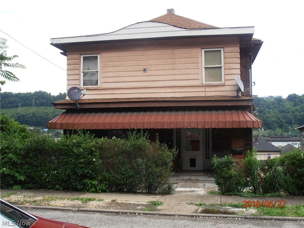 Attention Investors! Three unit building along with a two car garage that is also rented.