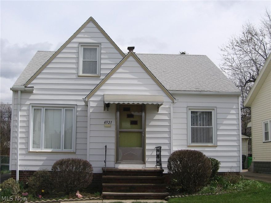 Just move right in to this well maintained cape. Long time owner cared lovingly for this home. Maintenance free exterior. Large living room and big kitchen that was updated with a great prep area and a roomy eating space that includes a built in china cabinet. Two decent size bedrooms complete the first floor. Upstairs is the master bedroom which is L-shaped, has nice wood floors and ample storage space. The lower level contains an absolutely gorgeous rec room that could hold your largest family gatherings. It features a wet bar, decorative fireplace, and separate sitting and dining areas. The utility side of basement has laundry hook ups and an extra commode. Home has newer replacement windows, updated electrical panel, and includes washer, dryer, stove, refrigerator.