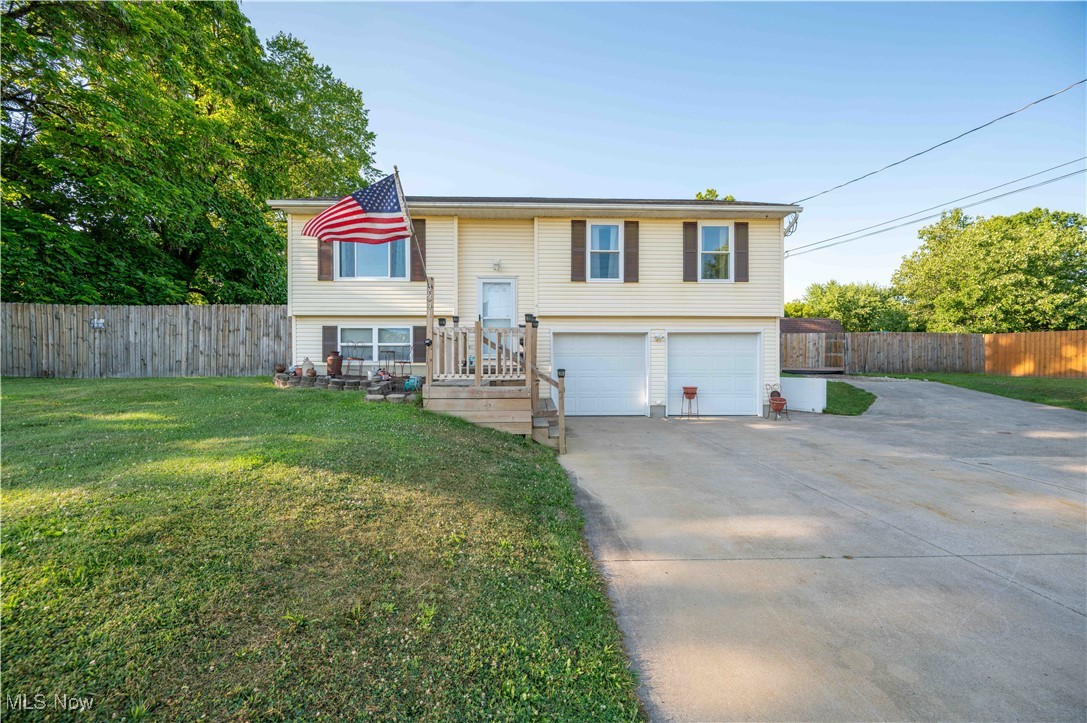 Welcome to this impressive 1,994 square foot bi-level home that perfectly balances comfort and entertainment. Built in 2000, this well-maintained 3 bedroom, 1.5 bath home showcases thoughtful updates throughout that will make you wonder why you waited so long to find it. All windows were replaced just two years ago with energy-efficient ratings, while recent upgrades include a new hot water tank and furnace with air conditioning system, both installed within the past year. The entire home features new ceiling fans and lighting fixtures complete with remotes, because who has time to get up and flip switches anymore? The heart of this home flows seamlessly through its bi-level design, offering living spaces that provide both togetherness and privacy. Three comfortable bedrooms provide restful retreats. Outside, your personal oasis awaits on the generous lot that truly shines. A three-year-old deck features a covered pergola complete with ceiling fan, creating the perfect spot for morning coffee or evening relaxation. The swimming pool becomes the centerpiece for summer gatherings, while three-quarters of the yard enjoys the privacy of wood fencing. Recent improvements include a new roof installed three years ago with leaf guards for low-maintenance living. The vinyl siding exterior requires minimal upkeep, while the attached two-car garage provides convenient parking and storage. An additional storage shed offers extra space for seasonal items and outdoor equipment. The finished basement adds valuable living space, perfect for recreation, home office, or flex room possibilities. This lower level expands your options while maximizing the home's square footage potential. Location is perfect for essential amenities, with grocery shopping, parks, schools, and public transportation all easily accessible. This move-in ready home combines updates with comfortable living spaces, outdoor amenities, and a prime lot that maximizes both privacy and entertainment possibilities.