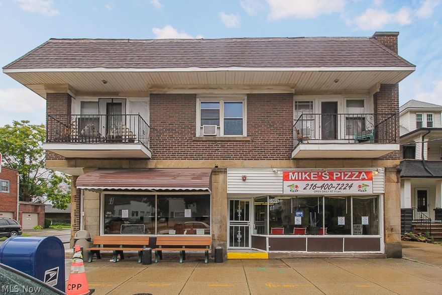 5 unit commercial building in the heart of Newburgh Heights. The building is mixed use, fully occupied but under rented. The property consists of three residential units and two store fronts. The first unit is a 4 bed/2 bath (2000 sqft) rented at $800 a month. There are two 2bed/1 bath units that are 1,000 sq ft each, both rented at $500 a month. The first store front unit is occupied by a strong performing pizza shop that was fully remodeled three years ago. The pizza shop rents is $500 a month. The second store front is a community center that has been there since 1978. That unit is collection $475 a month. There are four attached garages available for tenants. Mechanicals are in good shape. All tenants are on month to month leases. Rents can be raised with proper notice. Owner pays water,sewer,taxes,and insurance. Property is currently self managed by seller.