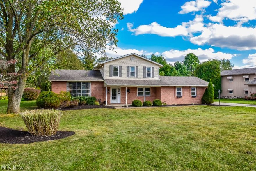 Unique, well thought out layout in this beautifully remodeled 3 bedroom, 2.5 bath 4-level split in Lake! Vaulted ceilings with a wood beam in the living and dining room. The living room has a huge bowed window for sunshine to fill the space while the dining room has sliding doors to the back deck. Prepare your favorite dishes in the gorgeous kitchen with stainless steel appliances, a breakfast bar, a pull out spice pantry, tile flooring and tile backsplash. Step down to the spacious family room boasting wood flooring, a tiled fireplace and a sliding door to the patio. Convenient half bath around the corner. In need of a productive work atmosphere? French doors lead to the secluded office with gorgeous built-in shelving. Upstairs, the large master suite offers a private full bath with tile flooring, new vanity and a walk-in tiled shower. There are 2 additional bedrooms and a full bath with a huge jetted tub and tile shower surround. Extra living space in the finished basement with a lar