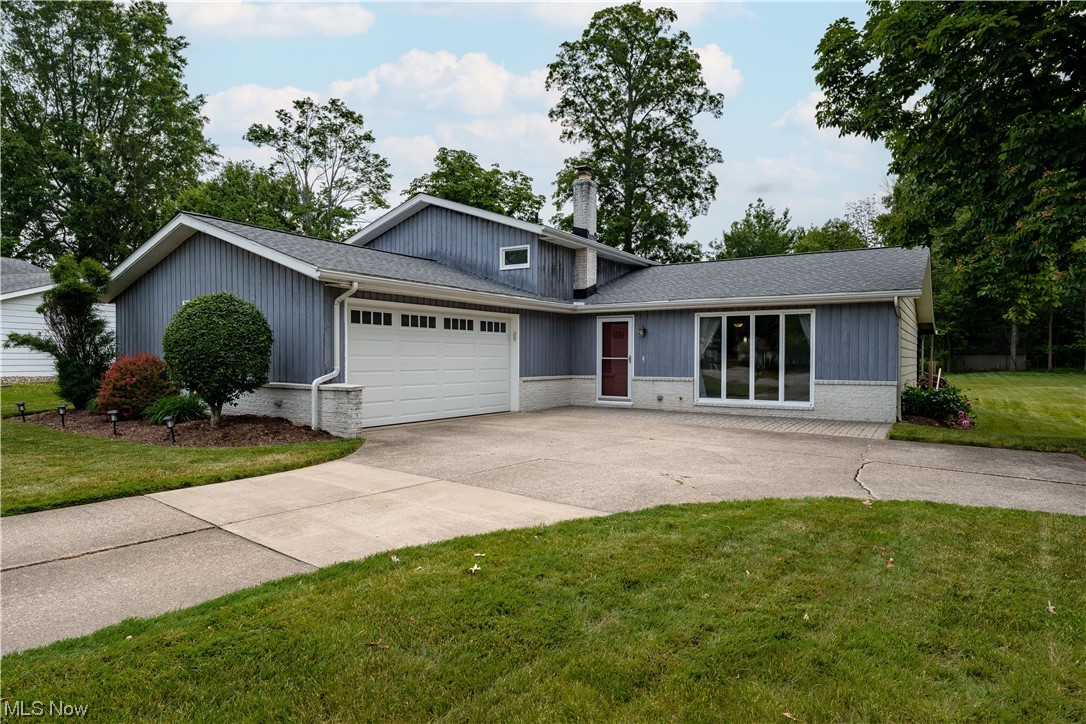 Welcome home to this beautifully maintained split level home nestled on a .30 acre cul de sac lot. As you enter the main level of the home, you enter the spacious living and dining rooms that offer low maintenance flooring and access to the back deck through the sliding door. The fully applianced eat in kitchen makes a breeze of meal prep and overlooks the backyard. A few steps down from the living room is the generous sized family room anchored by the brick hearth and wood burning fireplace. Conveniently located as you enter from the garage is a large laundry/mud room and powder room en route to the family room. On the second level of the home are 3 bedrooms and two full baths. All bedrooms have original, natural hardwood floors and generous closet space. Both the main bath and the en suite have been updated tastefully.Enjoy the warm weather from the large covered deck that overlooks the wooded backyard. Please be sure to add this home to your next home tour, you won’t be disappointed