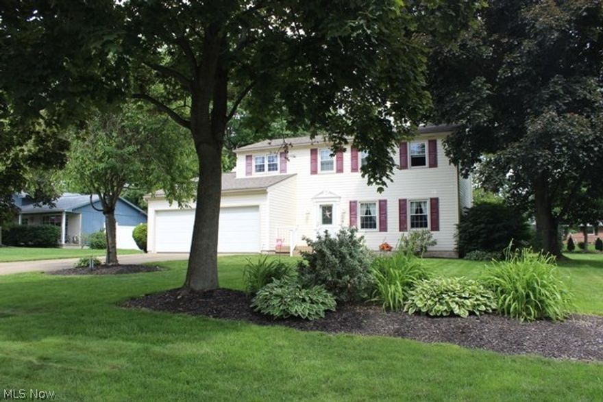 Wonderful location, wonderful setting, wonderful home! You'll feel right at home as soon as you enter the front door and all the way out to the relaxing backyard and patio. Great space to play and enjoy! 4 bedrooms, 2-1/2 baths, a great lower level finished rec room too! Master suite with private bath & walk-in closet, Comfy family room with fireplace and slider onto patio, ceramic tile kitchen open to the dining room area, and lovely front living room. No work to do here, move right in and start enjoying. Lots of updates since originally built-garage doors, tile, windows, vinyl siding, flooring, porch, gutters,  interior paint and more. Close to Barr Elementary - in the heart of Plain Township's walking paths and trails. A one year home warranty is included. Lots of appeal!