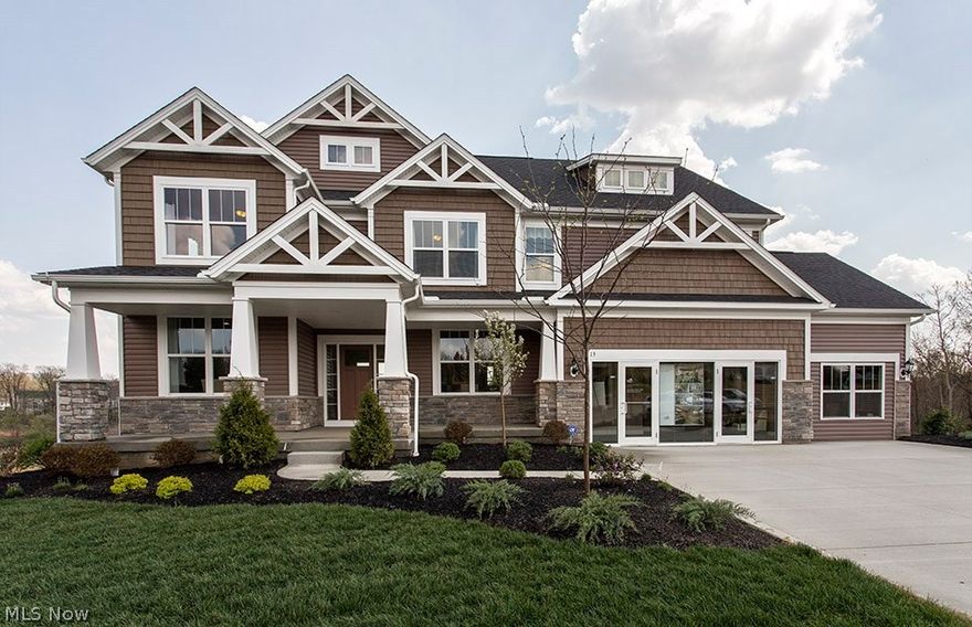 This new construction Deer Valley home design is situated on a beautiful wooded home site and will be ready for a May move-in! Join the fastest selling community, The Preserve at Miller's Farm, located in in the highly acclaimed and top ranked Revere School District! Homeowners will enjoy this stunning home for its exceptional use of space and its life-tested design including the 1st floor super laundry with abundance of storage, spacious walk-in pantry, and oversized everyday entry/mudroom off the 3-car garage complete with built-in lockers and storage closet. Upgrades include dramatic two-story great room with stone-to-ceiling fireplace, wrought-iron staircase, luxurious 5" hand-scraped hardwood floors, vaulted sunroom, and gourmet kitchen equipped with built-in SS appliances, gas cooktop, sub-way tile backsplash and enormous nine-foot granite island.  Home office w/ glass French doors, formal dining room, and Pulte Planning Center complete the first floor.  The 2nd floor offers a dr