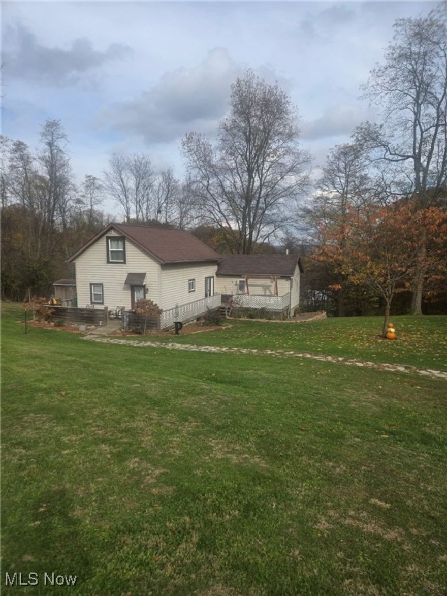 This secluded 3 bedroom 2 bathroom home is a MUST SEE!!! The vaulted ceilings throughout give a spacious feel to the home. The main floor features 2 bedrooms and 2 full bathrooms. The master bedroom includes a walk-in closet and bathroom. Sliding glass doors open up to a beautiful wrap around deck. The bay window overlooks mature foliage. The upper level possesses a 3rd bedroom as well as lots of bonus space that is perfect for a kids playroom, office, relaxing loft living room, and more! Located just minutes from Zanesville and the interstate... this beautiful home is a steal! Very well maintained and very up-to-date, with new flooring, fresh gravel in the driveway, and more! Ready to move in.... this perfect family home awaits YOU!