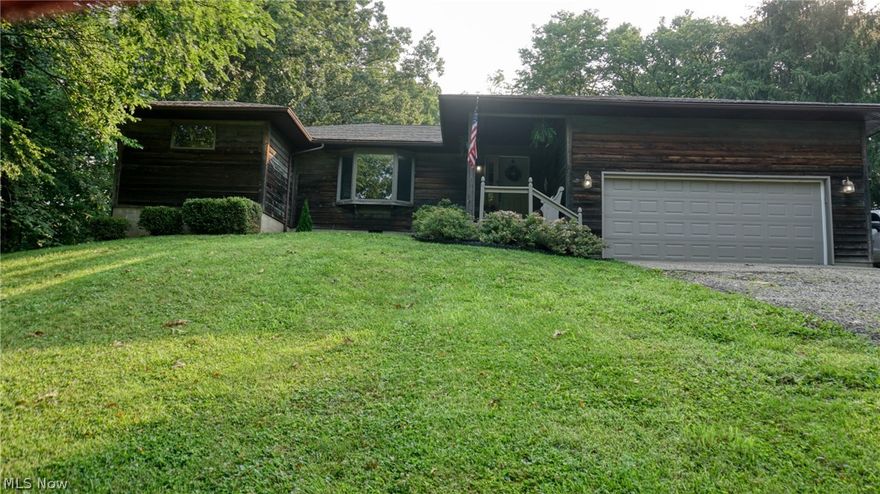 Beautiful cedar home on 2.64 acres that offers so much!  From the reclaimed 150 yr old hardwoods, updated main bath, fantastic kitchen with granite countertops, and loads of cabinets. You also have a lovely living room with lots of natural light.  There is a nice owners suite w/ a private bath and a walk in closet and..... there is MORE! You have a huge 4 season sunroom! This space is 14 x 30! Super nice home!