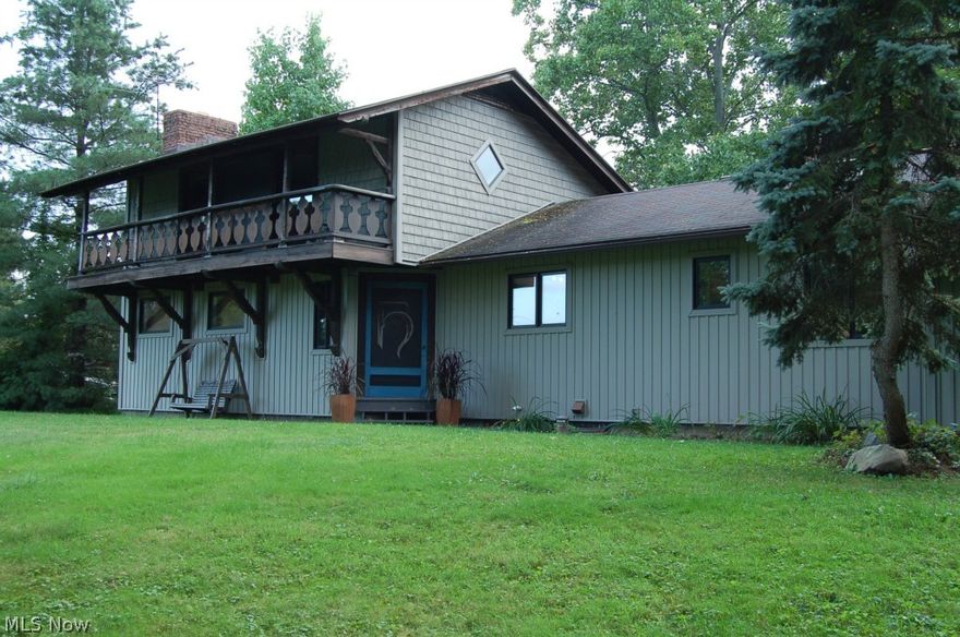 Very interesting and unusual custom home built by a master craftsman. Beautiful handcrafted woodworking throughout.  House has many recent updates and improvements including Dual fuel furnace, Remodeled kitchen with convection gas top stove and oven, remodeled baths, 2 beautiful WBFP and 1 WB stove.   1000 sq ft building which includes 2 stalls opening up to pasture, 24 x 36 x10 ft high fully wired workshop with 100 amp electrical service, concrete floor, insulated and drywalled with hot or cold running water.  Property is private and secluded behind mature trees and landscaping with gorgeous views!