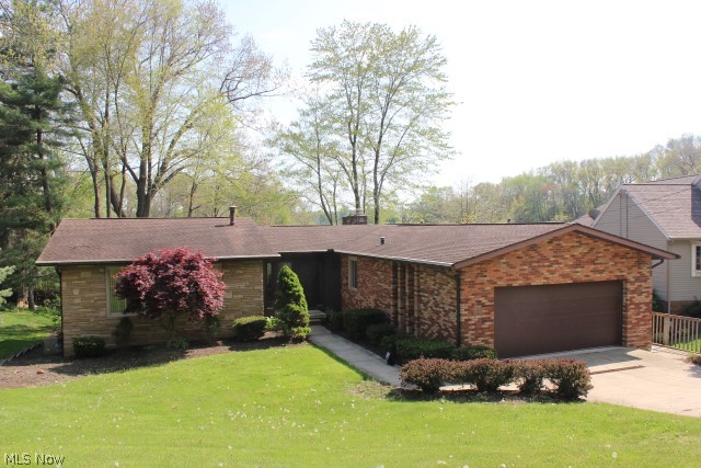 Best buy on Portage Lakes* A must see water front on main chain of Lakes w/4 bedrooms, 3 bath, approx. 3000SF including walk out lower level* Many updates including kitchen, 2 bath rooms, flooring (approx. 1yr.), windows, sliding doors, shingles, gutter guards, trex deck, central air, water heater, well pump & disposal (approx. 6 yrs.)*
Vaulted living room w/stone gas log fireplace* Family room w/stone gas log fireplace & automatic heatilator* Library with French doors & wood floor* Office with private entrance* Laundry area w/cupboards & folding area* Glass block windows* Zoned heat* Central air* Sewer/private well* Garage plumbed for gas heater* Plumbed for gas grill* Brick patio* Outside shower* Recreation facilities- picnic pavilion, tennis court, playground* Immediate possession* Absolute move in*