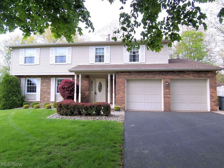 The hot summer weather is here and this beautiful, updated 4 bedroom home features plenty of room for a growing family and is about to get another update! The inground pool will soon (by June 10) have a brand new pool liner in time for lots of summer fun! The first floor features an updated kitchen with stainless appliances.  The family room has a gas fireplace and built in bookcases and access to the huge covered rear porch.  There's an updated half bath off the dinette area of the kitchen. A formal living room and dining room complete the first floor.  Upstairs includes a large master suite wth full, updated bath and walk in closet plus 3 additional, large bedrooms and a second full bath which has also been updated.  The basement has been waterproofed and features a finished recreation room and a second half bath.  The double attached garage has a Pebblestone floor.  The home comes with a 36x18 inground pool for your summertime enjoyment!  The roof was replaced in 2015.  The windows were new in 2010. The furnace and central air were done in 2005.  This home is located near the Mill Creek Park Bike Trail and this neighborhood is adgacent to Meander Reservour.  There is easy access to major highways and the Ohio turnpike.