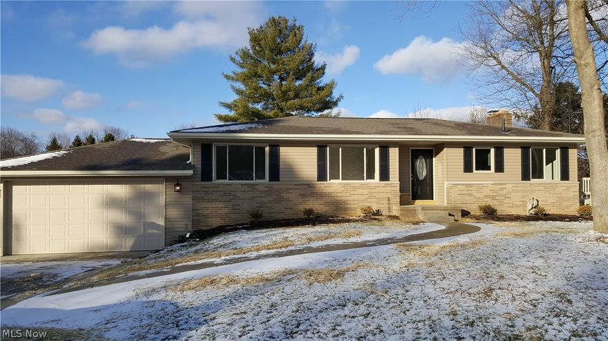 Imagine coming home to this beautiful home, fantastic water view, nothing to do but move in!  Completely remodeled home. New roof, siding, concrete drive, sidewalk ,garage, doors, hot water tank, septic, well, kitchen, baths, carpet, landscaping...this list goes on. Walk out basement features a fireplace, full bath, entertainment room and view of the water.