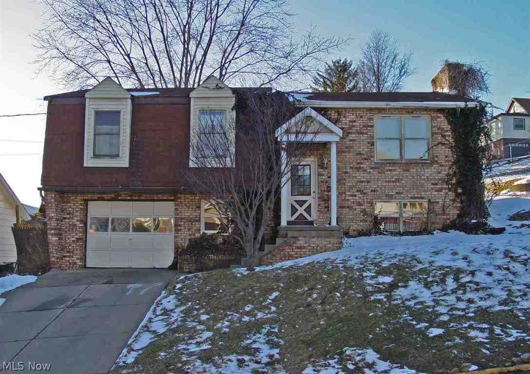This nice 3 BR home has a 3/4 BA in MBR & a remodeled full BA. New flooring on 1st level, carpet, hall, bedrooms. Floating floor in dining area and living room. Tile in kitchen. Freshly painted. Basement level includes Rec. Rm. with wood burning FP, 1/2 BA, laundry room and an office area. Garage has walkout basement door.