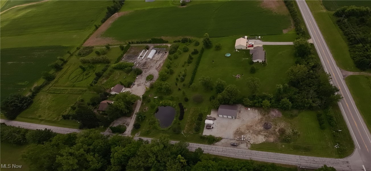 Discover an unparalleled opportunity to own a peaceful, rural lifestyle with this exceptional property in Camden Township. The true value lies in the expansive 7.58 acres of land, offering a foundation for a self-sufficient homestead, complete with a fully operational, 3-car detached garage that serves as an invaluable workshop for any project. While the land provides a blank canvas for gardening, farming, or simply enjoying the outdoors, the cozy home offers a comfortable retreat. The house features 936 square feet of finished living space with 3 bedrooms and 1.5 bathrooms, providing a low-maintenance layout that allows you to focus on developing the property's incredible potential. This is a rare find that combines a charming, functional home with a vast, usable acreage, and properties with this much to offer do not stay on the market long. Don't miss this opportunity to invest in your future and create the life you've always dreamed of.