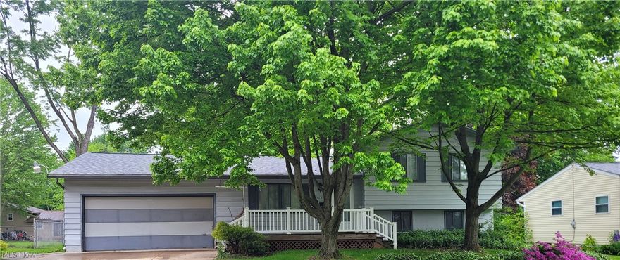 Bring your creativity to this 3 bedroom split level in Munroe Falls. It has 2 full baths and possible half bath off the laundry in the basement. The basement also has space to have a finished family or bonus room, and walks out tot he fully fenced-in backyard. The home also features hardwood floors in the bedrooms and a covered deck out back.