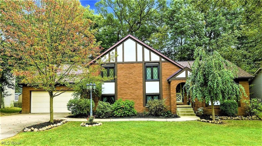 *Beautiful BRICK Front 4 LEVEL Split Tudor In Lake Twp. Boasts 1,728 Sq. Ft., 4 Bdrms, 2.5 Bathrooms & Attached 2 Car Garage On .30 Acres! *Established Residential Neighborhood *Wide Concrete Driveway, Winding Concrete Walkway, Great Curb Appeal ~ Colorful Trees *Enjoy The Back Yard Park Like Setting While Relaxing On Your Own DECK W/PERGOLA *New Owens Corning ROOF W/Lifetime Transferrable Warranty 2019 *New Gas FURNACE 2019 *WATERPROOFED Basement W/Lifetime Transferrable Warranty + Sump Pump Battery Backup System *Updated ELECTRICAL Panel, H20 Tank *Master Bathroom Completely Remodeled *Glam CRYSTAL LIGHTING *Diamond Gridded Stanek CUSTOM Crafted Windows, Upgraded Larson Storm Doors & More *Arched Covered Front Entrance *Walk In To A Foyer W/Crystal Lighting & Coat Closet *Living Rm W/Gorgeous Windows & Carpet Open To Dining W/Laminate Flooring, Chair Rail Molding, Chandelier & Sliders To The Back Deck! *The Kitchen Has Tile Backsplash, Island & Appliances That Stay *Upstairs Are 3 Bd