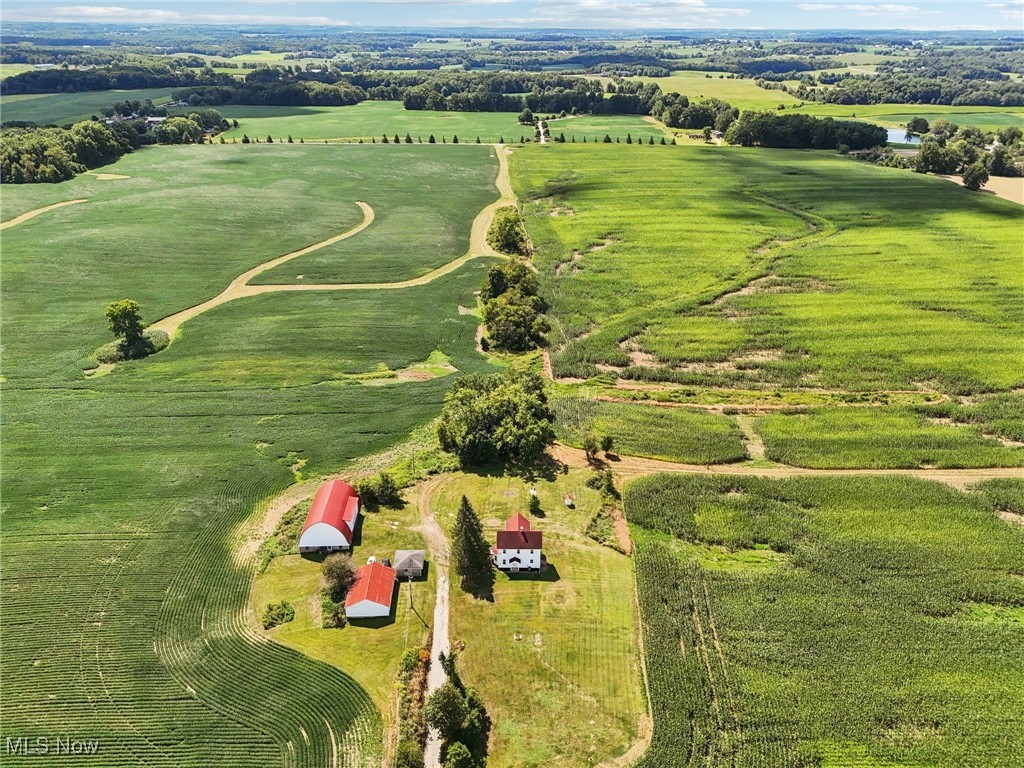Experience 160 acres of prime Wayne County farmland with a fully remodeled century farmhouse. This 3 bedroom, 2 bathroom home has been thoughtfully updated with a new kitchen, new appliances, updated bathrooms, fresh paint, new flooring—turnkey and move-in ready. Additionally, the home has new insulation, new windows through entire home and new electrical. Outside, a classic bank barn with a new roof in 2024, workshop, and detached garage provide abundant storage and functional space for farming or hobbies. An active gas well delivers free natural gas to the property, provides royalties and all mineral rights convey with sale. Septic was replaced in 2023. Whether you’re seeking a working farm, investment opportunity, or private retreat, this one-of-a-kind property combines modern living with rural charm.