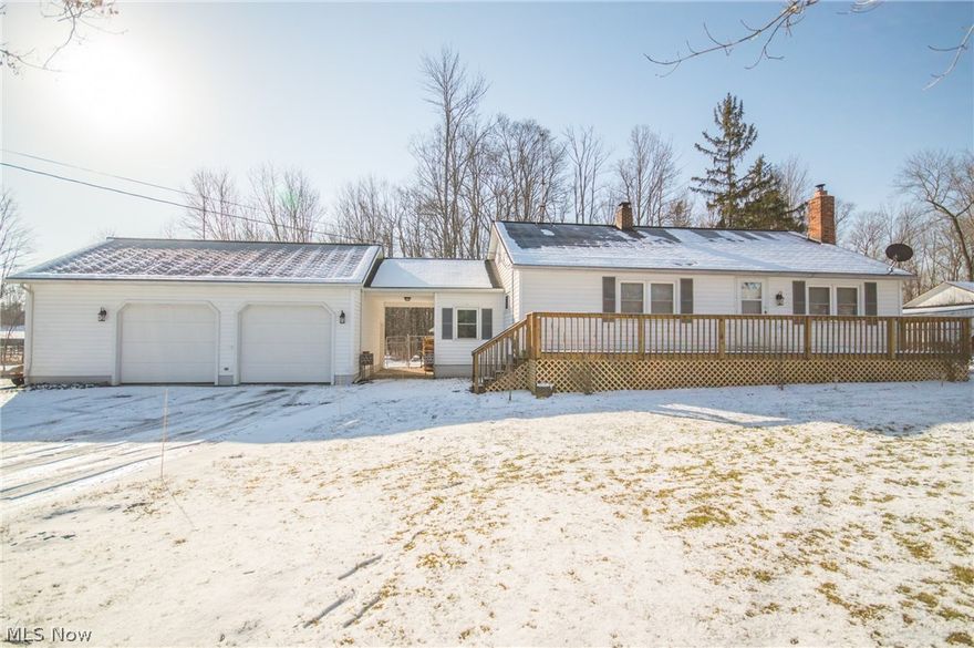 Adorable move in ready cape cod!  Newer windows and doors.  Remodeled Kitchen with glass backsplash. Beautiful Hardwood floors in living room and downstairs bedrooms.  The large living room boasts a beautiful floor to ceiling stone wood burning insert with a heat elater that will keep the house toasty throughout the cooler months.  Second story was previously finished along with the addition of the 1/2 bath, breezeway and 30x24 oversized garage with its own 220 electrical service.   The basement is ready for finishing touches and has a wrap around crawl space for access to plumbing.  New water softener in 2017.  New treated, sealed and waterproofed front porch runs the length of the house  The fenced in back yard has a fire-pit as well as the side yard has plenty of open space for entertaining.  New light switches/plates throughout.  Septic has been well maintained.  This amazing home is located in Mespo Twp.  Septic System has passed in March with Trumbull Cty Health Dept.  All kitche