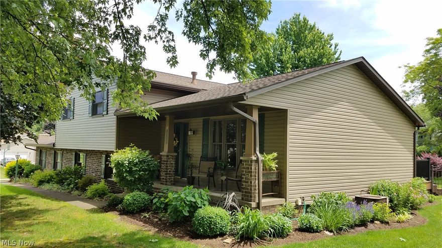 Beautifully updated and extremely well maintained 4 level split offers an exceptionally well landscaped .48 acre lot. Oak flooring in main entry and oak trim thru out. Kitchen has been freshly painted with neutral colors and also offers all updated appliances, sink and faucet, vinyl floor, cabinet hardware and counter-tops. All windows (except garage window) and sliding glass doors replaced with Andersen brand. Garage door replaced approximately 10 yrs ago - opener replaced in 2015. Roof approx 5 years old. New vinyl siding, soffit and gutter guard in 2016 . Composite deck in approx. 2013 and aluminum iron look fence installed 2010-2015. Wood burning fireplace in family room can easily be converted to gas - chimney has new crown, tuck pointed and re-coated inside. Both bathrooms updated. Neutral carpet and paint thru out within the last 7 years. 12X10 outbuilding. Don't miss this one!