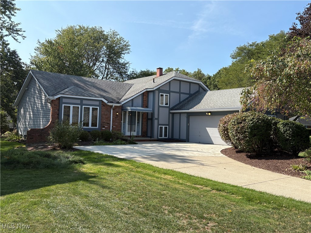 This is a Unique Split Level, Main Level has Living Rm., Dining Rm. and Kitchen that leads to a 2 tier Deck. the 2nd Level is where the Master Bedroom and 2 other Bedrooms are located with a Full Bath. The Lower level is where you are in the Family Rm with a Fireplace and on the same level is a Full Bathroom and a Bedroom and also the Mudroom that leads to the Attached Garage. The Basement level has a Finished Rec. Room with a area that has upper and lower cabinets with counter top, washer and dryer, also has a large walk-in closet and walk-in shower room, the furnace and h2o tank are in a separate room on the same level. This is a vinyl sided with some wood and brick features, Gutter Guard gutters, on a large corner lot, professional landscaping. make this your home before the holidays.