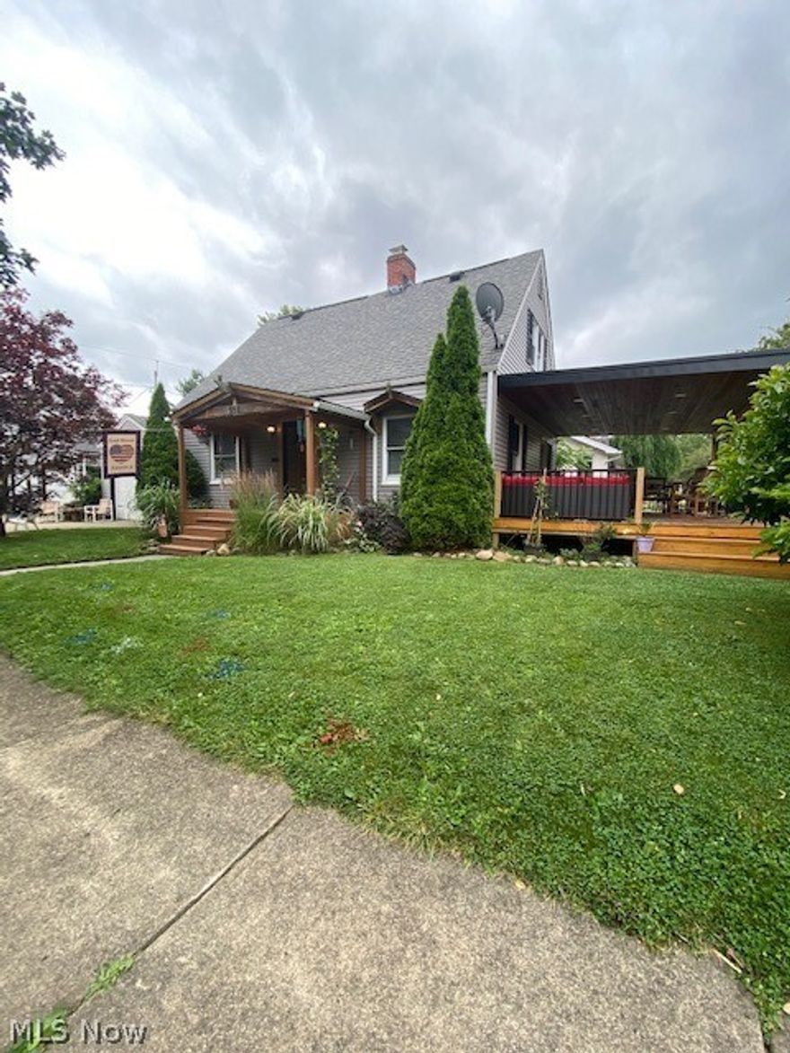 This inviting Cape Cod is in the heart of Firestone Park and features a first floor bedroom with full bath. An additional fully updated bath is located on the second level along with 2 more sizable bedrooms. Natural oak hardwood floors flow from the dining room to the large living room. Sliding glass doors lead you to a fabulous 14x25 covered deck complete with barn siding ceiling, led lighting, aluminum railing, and metal roof. The lower level offers a spacious family room with 1/2 bath. Breezeway located off the kitchen to a 1 car attached garage with separate 2 car detached garage. Call today to schedule a private showing!
