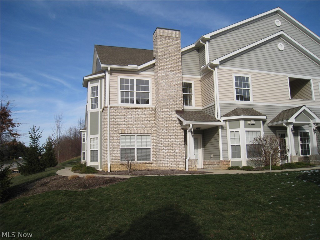 Most popular 1st floor end unit with lots of windows and tons of upgrades!! Big bright great room with fireplace opens to a gorgeous cherry stained kitchen. Rich granite countertops, custom stone backsplash, stainless steel appliances and ceramic flooring. Upgraded lighting, brushed nickel plumbing fixtures, upgraded flooring and neutral colors throughout. Large Master Suite with walk-in closet and private patio area. Extra deep attached garage, spacious laundry with washer and dryer included. Recreation area with pool! Absolute must see!