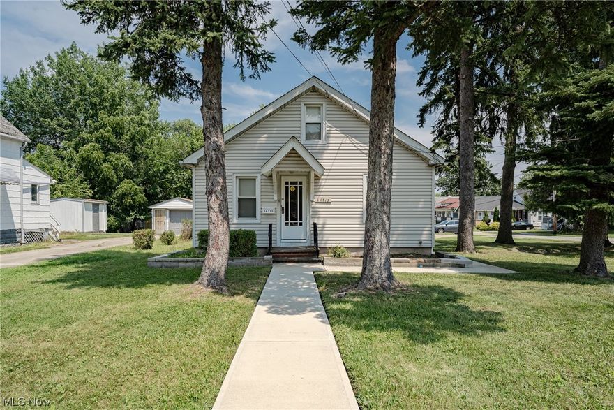 Great opportunity for a well-kept ranch in Maple Heights! This lovely home features 1006 square feet of living space with 3 bedrooms, 1 full bathroom, sizable living areas, updated windows, several mechanical upgrades, and more! The front door opens into a welcoming living room that features plenty of natural light and newer carpeting. Head back to the kitchen that includes plenty of cabinetry and newer LVP flooring. All it needs is your choice of appliances! There are two bedrooms off of the kitchen, as well as an updated full bathroom. The third bedroom is located off of the living room at the front of the house. The full lower level provides plenty of storage as well as laundry hookups. Additional recent upgrades include updated electrical and plumbing, fresh insulation, a new water tank in 2021, new furnace in 2021, and a new roof in 2018. Outside, there is a big yard with a 2-car garage and mature foliage that provides privacy and shade. Conveniently located just minutes away from