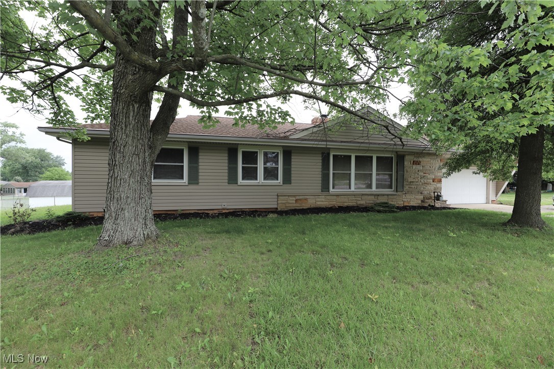 Welcome home to this beautiful sprawling Ranch! Family Room with wood burning fireplace, spacious eat-in Kitchen with all appliances, Nice size bedrooms. Original hardwood flooring throughout. Newer tankless water heater , most of the plumbing has been updated. Updated full bath. Additional updates include sinks, paint, lighting, garbage disposal. Basement was waterproofed and has transferable warranty. Enclosed Sun porch off the Kitchen. Less than a mile from the Historical Medina Square. A must see! Seller selling as is.