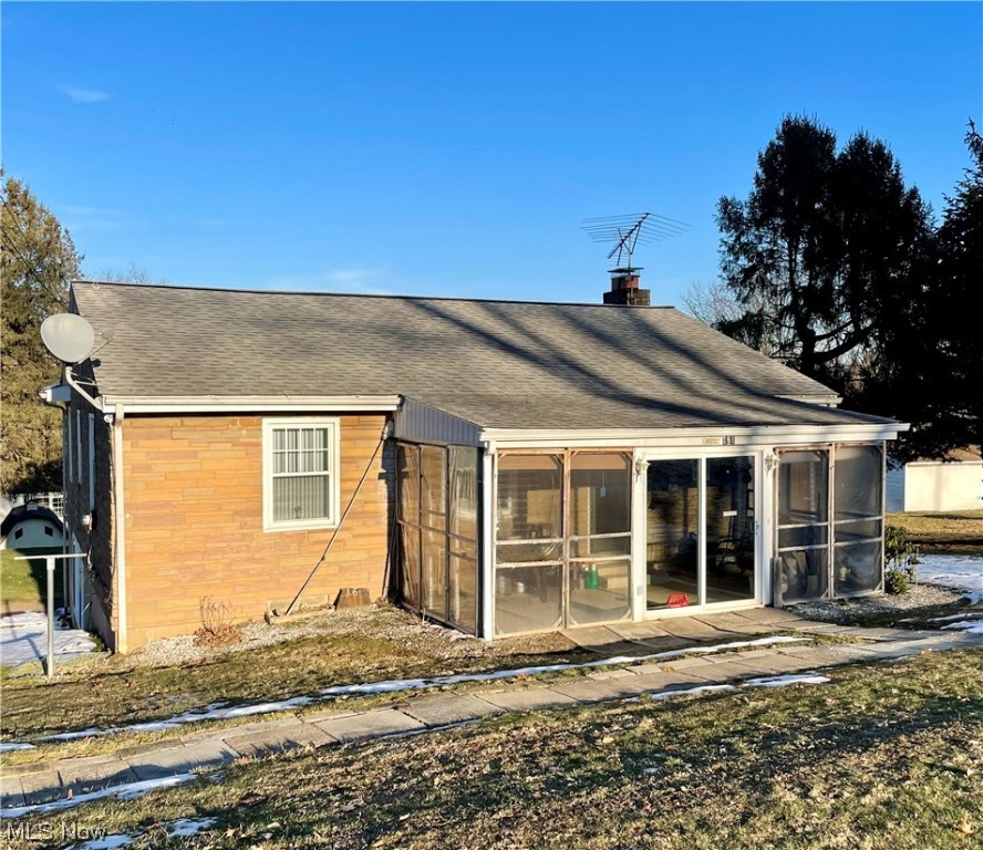 This adorable 3 BR, 2 BA home sits serenely on a dead end street in a rural neighborhood. The house features beautiful hardwood floors, lots of kitchen cabinets, a huge finished basement with wood burning fireplace and a half bath. Take advantage of the 2 story garage with room for a workshop and parking for 3 cars, tractors, ATV's or whatever you choose. The back has a deck looking over the lovely grounds and grape arbor. The front porch is enclosed with a swing and plenty of room for your outdoor furnishings. All this on a 1-acre lot.