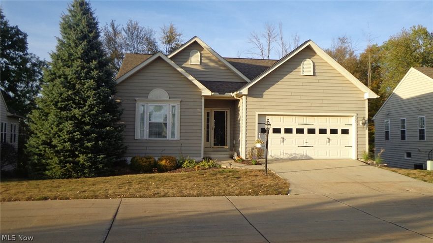 Located in the beautiful Brandywine Preserve off Twinsburg Rd this low maintenance ranch awaits your visit. The natural views and tranquil sounds of the creek present themselves from the first floor deck continuing down to a stamped concrete patio off the lower level walkout. While enjoying your private back yard relax your muscle in the outdoor Jacuzzi tub also located on the lower level patio. Tall ceilings and an open floor plan are found throughout the main level kitchen and family room with a more than adequate amount of natural window light. The First floor master is private with its' own full bath and plenty of room for a large king bed with dresser set. Two other bedrooms are adjacent to master. The main foyer area has an entrance to the lower level recreation and entertainment area. In this area you'll find all finished guest bedroom, full bathroom, and plenty of room for entertaining visitors with walkout patio. That's over 2700 sq/ft of total space. If lugging laundry up and