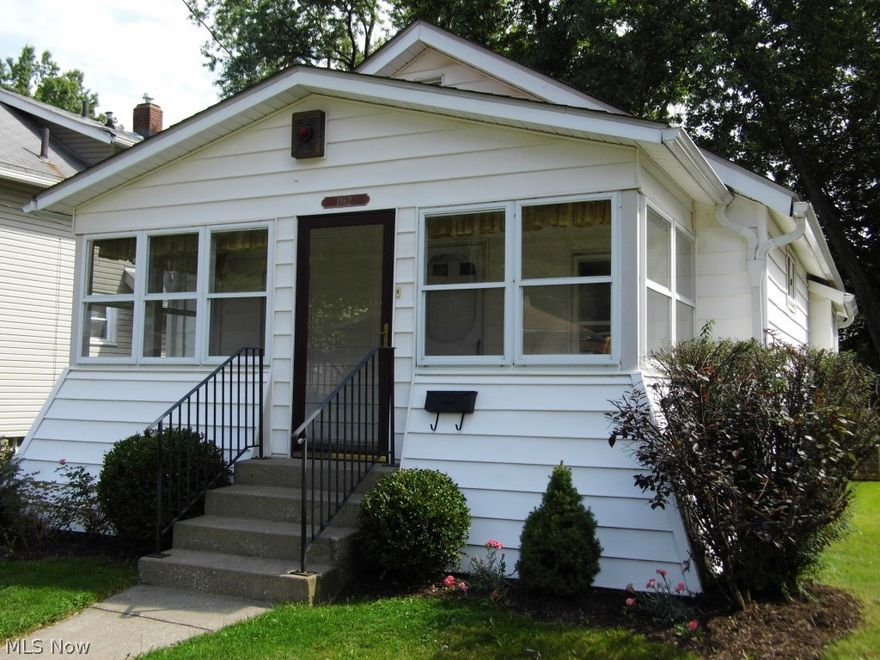 This was a quaint family home for over almost 15 years for present owner who just installed BRAND NEW CARPET in neutral frieze color. Painting also just completed, newer furnace and air conditioning, updated flooring, vinyl siding and newer dimensional roof all compliment this home! Large living room with window seat, front enclosed porch with windows, electric and storm security door. Bright kitchen with laminate flooring and eat in kitchen room over looking the rear fenced in yard and single car garage. Rear patio with covered roof allows you to sit outside and keep an eye out on the kids or pets with wood fence enclosing the back yard with gates. Nice landscaping with good color round out the well kept look of this home. Owner likes the neighbors and surrounding houses look good too. Updated electrical box, water tank and furnace with air conditioning are a bonus to the waterproofed basement that has a bathroom in the basement and plenty of dry storage. Basement even has glass block