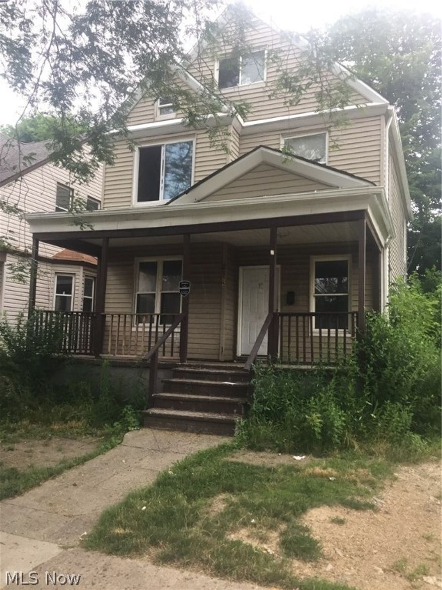 This large colonial located near the Cleveland Clinic has great potential. This home features a large front porch, living room, sitting room, formal dinning room, and a eat in kitchen.  The second level offers 3 large bedrooms, and a full bathroom. The third level has one large room would make a great master suite. The home has an upgraded electrical system, vinyl windows, glass block windows, new furnace, new hot water tank and vinyl siding. Call today to schedule your tour.