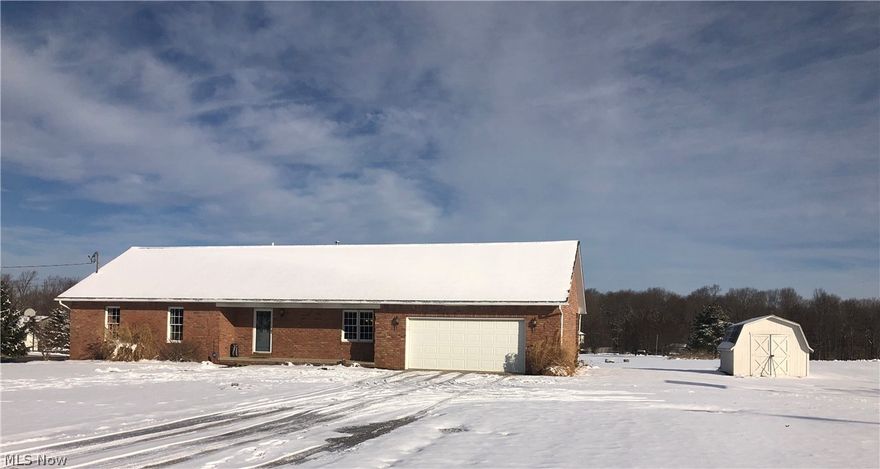 Beautifully updated and move-in ready brick ranch on 2 acres, Norwayne Schools.  Recent updates include: 2014, kitchen appliances and counter tops; some flooring; paint and trim; some lighting; new interior doors; electric heat pump 2019; D-box on septic tank 2018;  The fireplace in Living Room is wood burning and there is also a stone fireplace in the finished lower level family room that has a propane insert.  Seller has never used, but hook up is there if buyer chooses to use and get a propane tank. The lower level utility/storage room has a walk-out to the back yard.