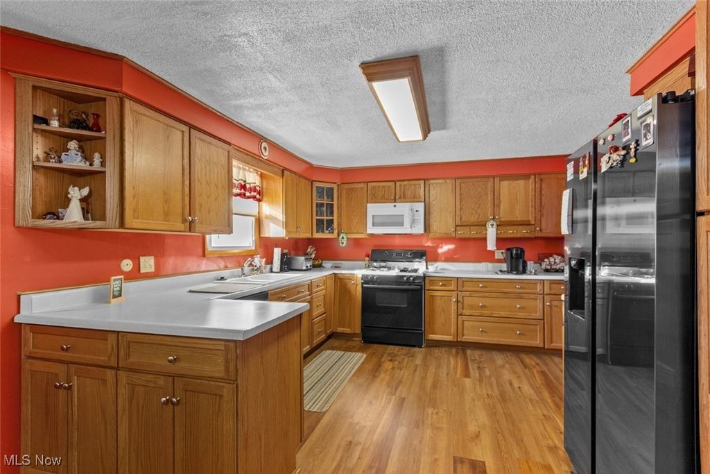 Photo of 557 Windamere Avenue NW, Massillon, OH 44646 (MLS # 5182898)