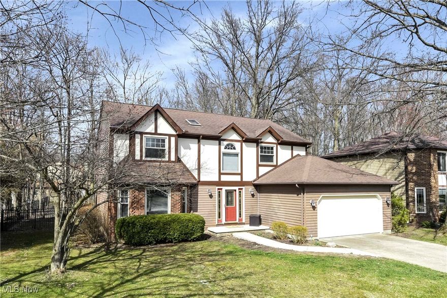 Prepare to be Moved! Welcome to this beautifully updated Tudor Colonial located at 21242 Jonathan Dr. in Strongsville. With over 2,900 sq ft of living space, this home offers an abundance of natural light and a spacious, open floor plan perfect for entertaining. The charming exterior of the home provides stunning curb appeal and a warm welcome. Inside, you'll find a spacious living room, a cozy family room with a beamed ceiling and fireplace, a formal dining room, and a recreation room in the partially-finished basement—there’s plenty of room to entertain family and friends. The large eat-in kitchen includes crisp white cabinets and ample counter space ideal for meal prep and casual dining. The first floor also features a convenient half bath, a spacious pantry and easy access to the 2-car garage, and a functional layout that ties the home together. On the second floor, there are four generously sized bedrooms with plenty of closet space. The primary suite is a true retreat, offering vaulted ceilings, double closets, and a luxurious en-suite bathroom with a garden tub, separate shower, and double vanity. Updates include - front porch and walk way replaced in 2024, newer flooring in many of the rooms and newer windows. The air conditioner, furnace, and hot water tank were all replaced in 2020. Step outside to enjoy a spacious, treed backyard with a patio area, perfect for relaxing or hosting gatherings. The home is ideally located with easy access to Valley Parkway and nearby Metroparks. Strongsville amenities include a top-notch recreation center and excellent shopping and dining options at SouthPark Mall. This home is a must-see for those looking for a move-in ready property that blends comfort and style. Don’t miss the chance to make it yours! For more details or to schedule a showing, contact us today!