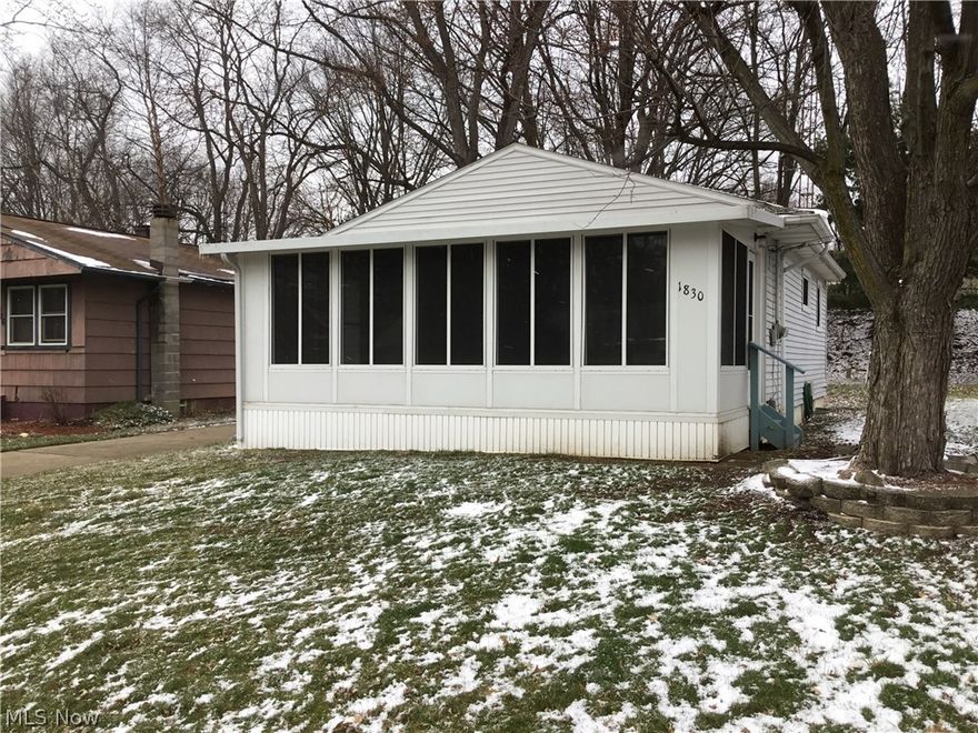 Featured for sale is a 2 bedroom, 1 bathroom 2 car garage ranch home. The home has had updates to include vinyl siding, and vinyl replacement windows.    This home features a nice size eat-in kitchen, nice size living room, sun room off the front of the home and full partially finished basement.  The sale includes three parcels, (home, garage and lot next to garage).  Taxes reflect all three parcels with homestead exemption on the home.  Property is being sold "AS IS".