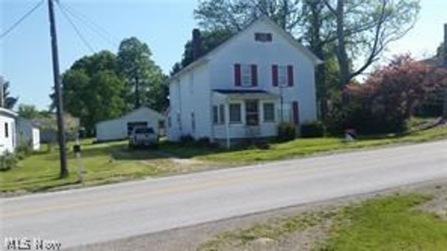 Investors Special!! 4 Bedroom Colonial with new vinyl windows. Needs some updating to make a great home  or investment. Priced Right! 1.5 car garage with attached workshop.