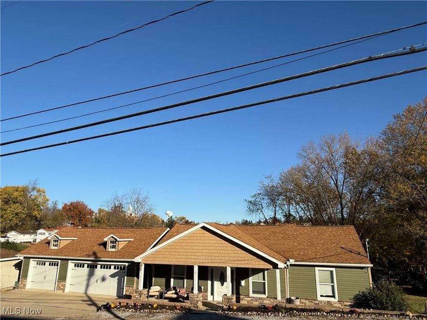 Rare Find: Expansive 5 Bed, 3 Bath Home in St. Clairsville! Step into this spacious remodeled home offering an open concept, as you enter into a large living room which flows effortlessly into the stunningly updated kitchen with custom-made cabinets and special granite countertops. Enjoy hosting dinner parties in the elegant dining area, featuring a beautiful tray ceiling and french doors that lead to the enclosed back deck. Laundry room is located on the main floor, making the chore very convenient. The large basement houses two rec rooms with a ball pit area for the kids to enjoy, a craft room, the 5th bedroom, storage area, plus an area with a drain if you would like to add a bathroom downstairs. Around back there is plenty of space in the yard for entertaining and recreation, including a large deck and above ground pool. The home also features a newer built detached garage, completed in 2020. Other updates include roof shingles, hot water tank, and furnace all in 2017. Built with character, this home provides ample space for a growing family or those who love to entertain. Call to schedule your tour today.