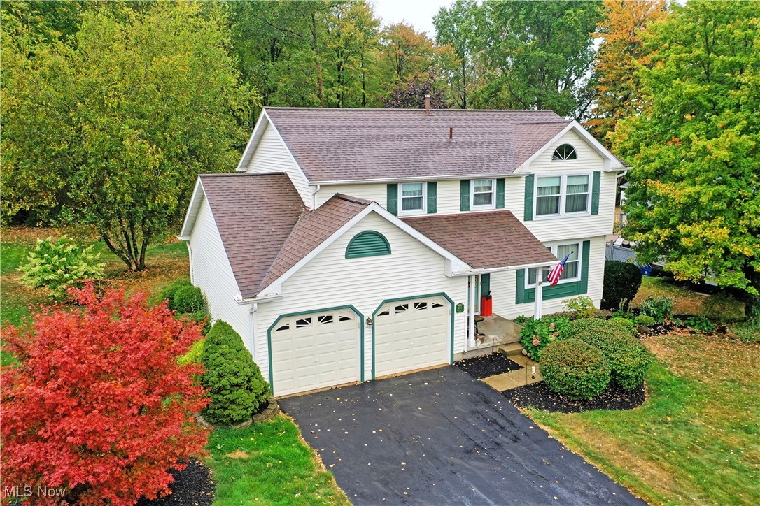 Welcome to your dream home in Cortland! This stunning residence effortlessly blends timeless charm with modern elegance, offering two expansive floors of beautifully designed living space, plus a full basement. Nestled in a sought-after neighborhood, this captivating home makes a lasting first impression with its meticulously manicured landscaping, bursting with vibrant fall colors that beautifully frame the bold green trim and spacious rear deck—perfect for enjoying the serene, tree-lined views.
Step inside as warm hardwoods line the foyer, sweeping away down the near hall past a lovely half bath. The cozy, carpeted living room, bathed in natural light from expansive picture windows, is ideal for relaxation.
Around the corner, you’ll find a formal dining room that’s perfect for hosting elegant dinner parties or enjoying intimate meals. The heart of the home—the kitchen—is a chef’s dream, with custom cabinetry, extensive counter space, and sleek finishes. The sunny eat-in dining area is complemented by sliding glass doors that lead to the deck, bringing the outdoors in. Just beyond, the spacious family room offers a welcoming, open space for everyday living and entertaining. Upstairs, you'll discover four generously sized bedrooms, each offering its own unique charm. The oversized master suite is a true retreat, featuring a luxurious walk-in closet and a private bath. The additional bedrooms are equally spacious and share a beautifully appointed full bath.
Convenient laundry service is located in the basement, offering ample storage and additional potential to make this home truly your own. With its prime location, gorgeous design, and thoughtful details throughout, this home offers unparalleled comfort and style. Don’t miss your chance to make this spectacular one-owner home yours. Call to schedule your private tour today!