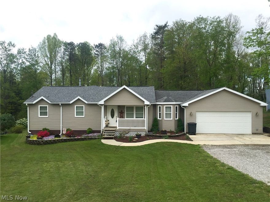 Amazing top-quality remodeled home offers newer Pella Low-E windows, siding, roof. Spacious living room with bay window. Kitchen has breakfast island and new countertops. Brand new flooring in kitchen and dining rooms with French door access to rear. Huge master bath with corner Jacuzzi, 4' shower, walk-in closet. Convenient first floor laundry. Mudroom entry from 2 car garage. Lower level has L-shaped family room with fireplace, 2 bedrooms with walk-in closets (one used as office/den) and full bath. Storage area added for lawn equipment.  Big lot with woods for rear privacy. A Must See! M808  Elem: Warren Elementary School  Elem/Bus: Y  JrHigh: Warren Middle  JrHigh/Bus: Y  High: Warren High School  High/Bus: Y  Fire: VOL  Police: SHF  ;SQFT=Fin L1:1636, Fin Bsmt:900, Fin Above:1636, Fin Total:2536, Unfin Bsmt:140, Unfin Above:140;GAR= 2 Car Att, Opener(s);PRKG= Off Street