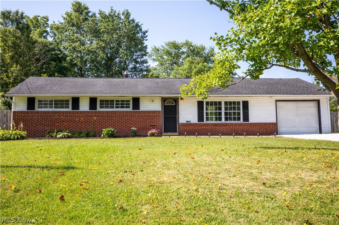 This Ranch style home offers you 4 Bedrooms and 2 Full Bathroom in the Streetsboro Area! Once entering you will see the open floor plan between the living room, dining room and kitchen. The kitchen comes with Refrigerator, dishwasher, stove, built in microwave and garbage disposal. The 1 car attached garage offers a work bench area along with storage above. The backyard comes with a fireplace on the patio which you can enjoy all while maintaining your privacy offered by the fenced in backyard. The Master bedroom features a walk-in closet and has master bathroom as well. Electric Panel has been updated and the Washer and Dryer come with the purchase of this home. This property is located within minutes to all that Streetsboro area has to offer, don't miss out and schedule your private showing today.