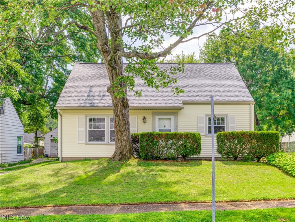 Over 1600 square feet in this competitively priced Cape Cod. Great location and excellent curb appeal is just the beginning of what could be your next home. Featuring a huge addition that boasts a wood burning fireplace and a convenient attached 24' x 24' garage. The kitchen offers lots of countertop space and is open to the Great Room. There is also a formal living-room and two bedrooms on the first floor. The second floor includes two more nicely sized bedrooms. You can bring your decorating ideas to make this home your own, but what you will not have to do is add vinyl siding, tub surround and vanity, a roof, insulated garage door, or central air. Windows have also been replaced at some point. An expansive deck and extra side lot gives you space for all your outdoor activities. Take the leap. Invest in your future. Call for a private showing today. (Home is being sold to settle and estate and will be sold as-is.)